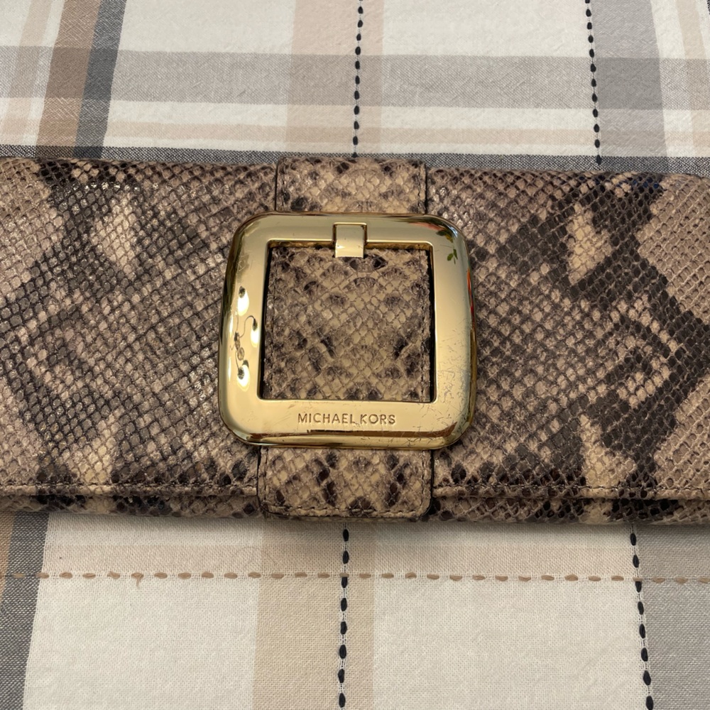 michael kors snakeskin clutch with gold buckle